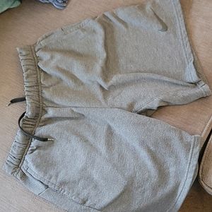 Nike Dri-fit shorts with draw string/elastic waistband. Grey